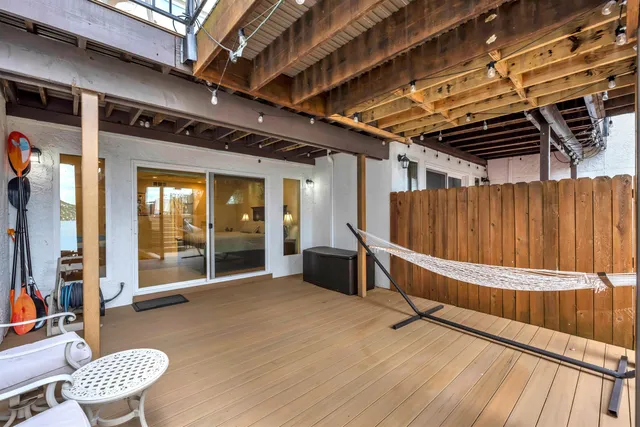 a view of an chairs in wooden floor