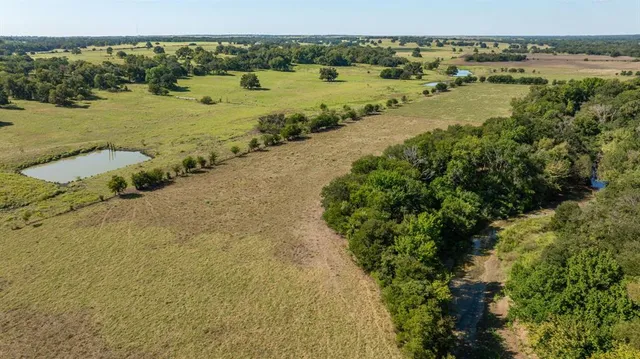 a view of a lake with beach