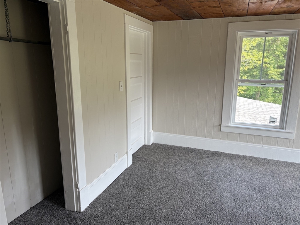 208 Greenfield Road Deerfield, MA 01373 - Photo 11 of 27 a view of an empty room with a window