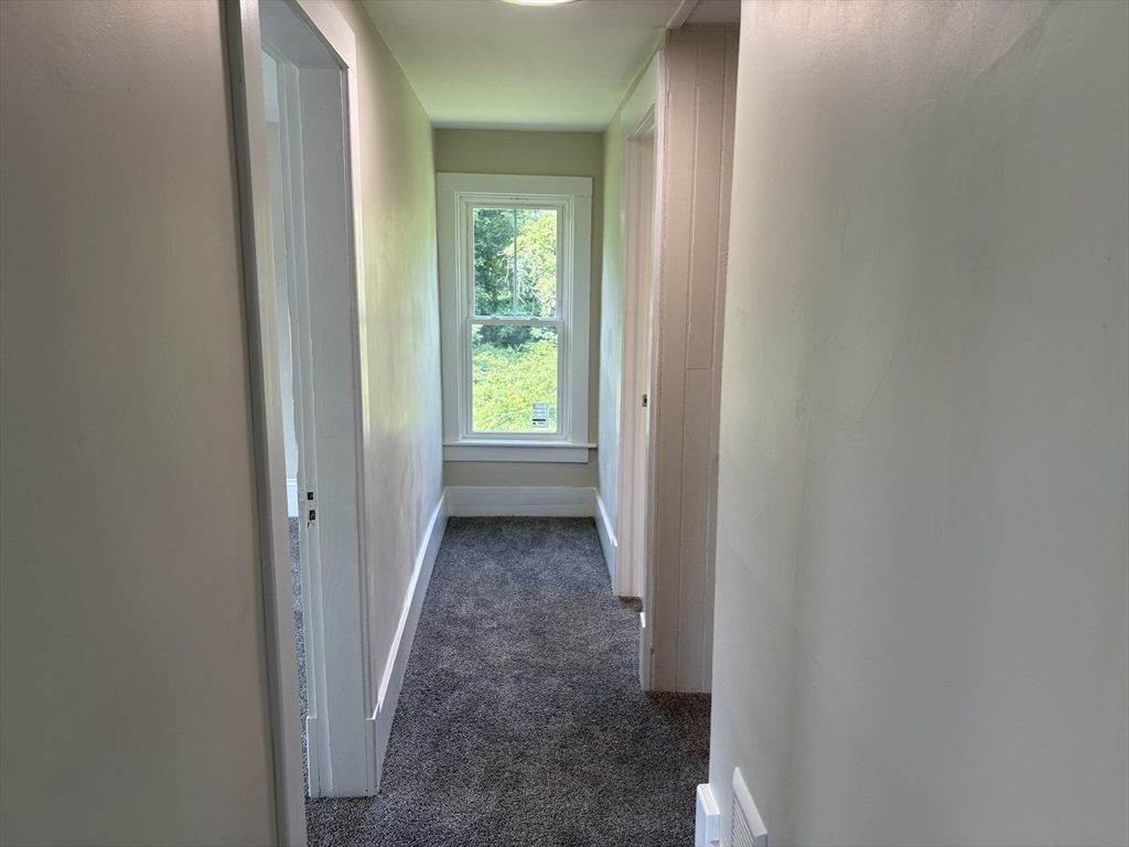 208 Greenfield Road Deerfield, MA 01373 - Photo 12 of 27 a view of a hallway with a closet