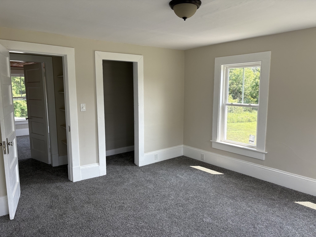 208 Greenfield Road Deerfield, MA 01373 - Photo 14 of 27 a view of an empty room with a window