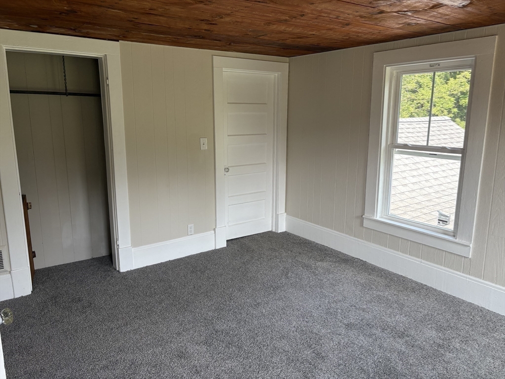 208 Greenfield Road Deerfield, MA 01373 - Photo 17 of 28 an empty room with windows