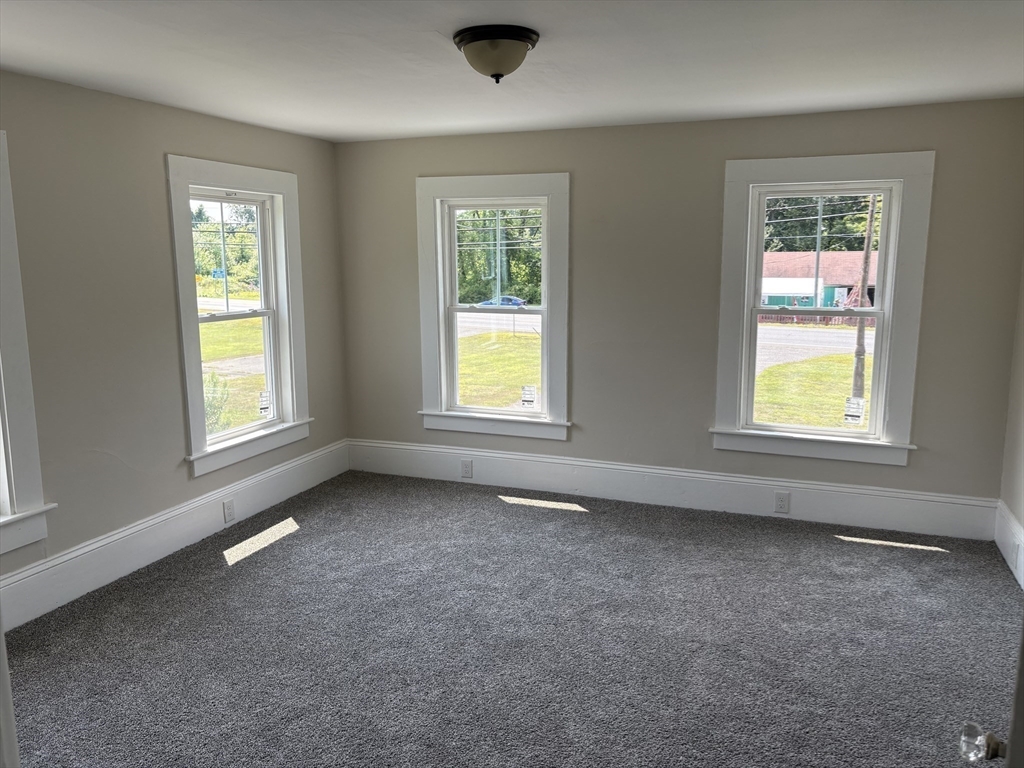 208 Greenfield Road Deerfield, MA 01373 - Photo 18 of 27 an empty room with windows