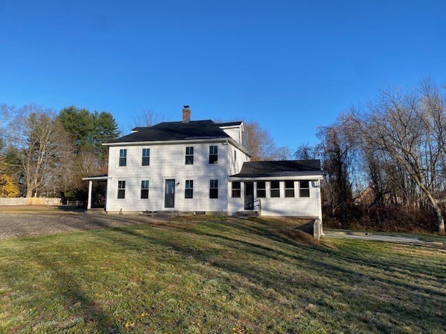 208 Greenfield Road Deerfield, MA 01373 - Photo 2 of 28 a front view of a house with a garden