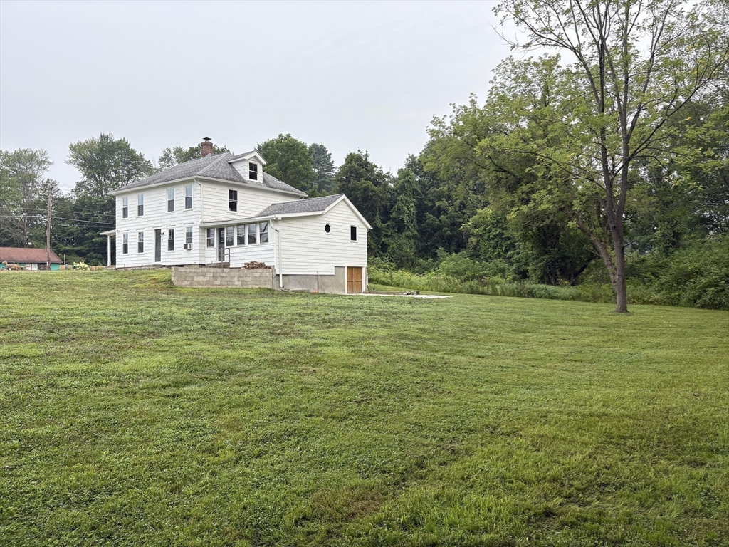 208 Greenfield Road Deerfield, MA 01373 - Photo 4 of 28 a view of a house with a big yard