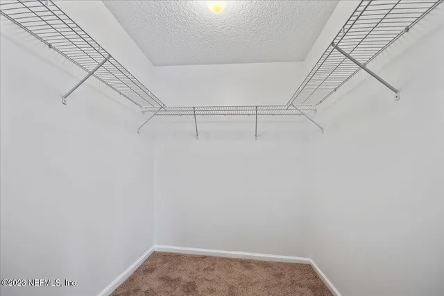 a view of small space with racks on the wall