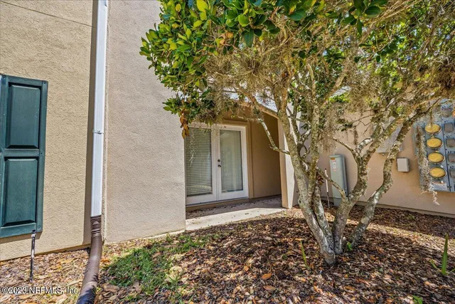 a house with trees in front of it