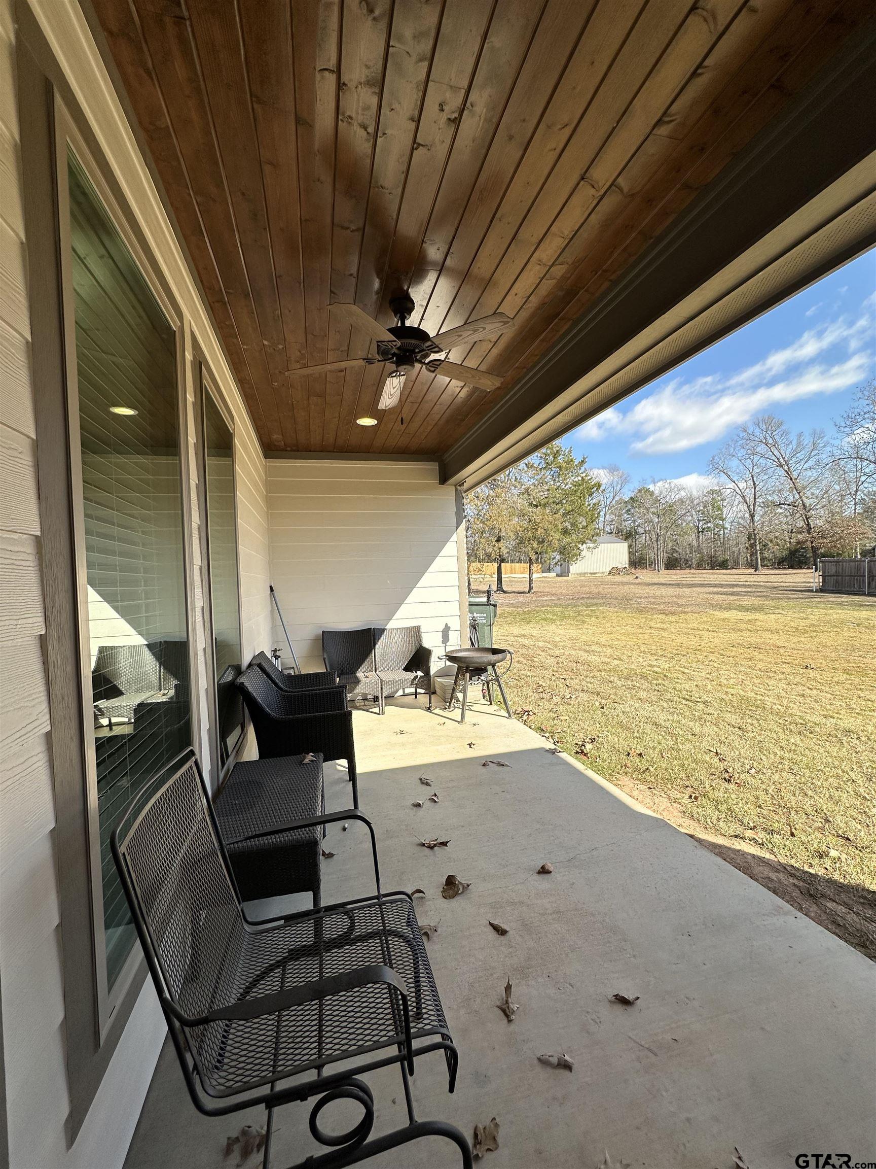345 Willow Creek Ranch Road Gladewater, TX 75647 - Photo 46 of 47 a view of an ocean and a kitchen