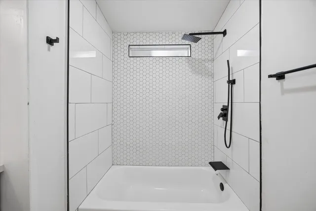 a bathroom with a bathtub