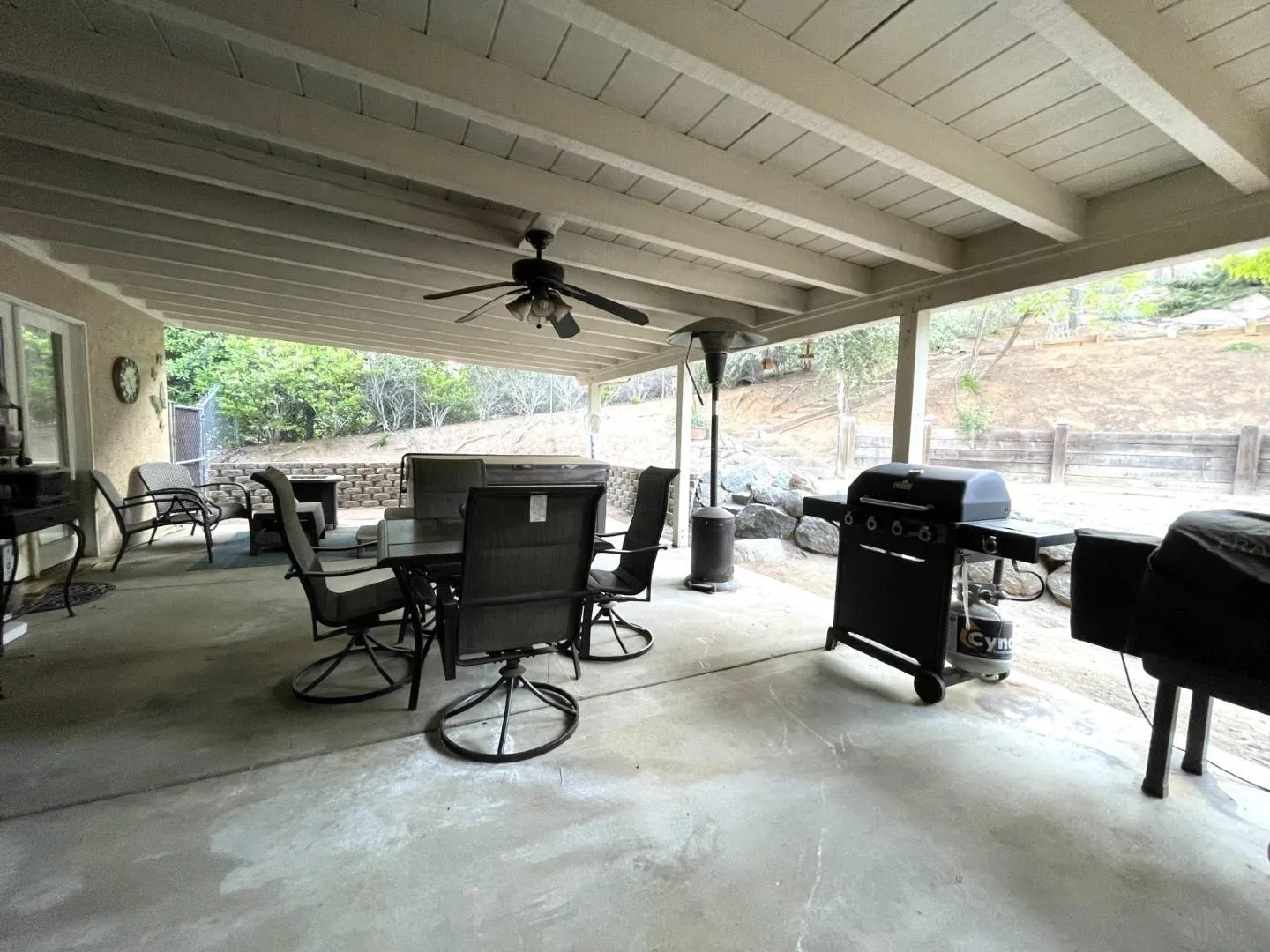 16734 Georgios Way Ramona, CA 92065 - Photo 17 of 35 a view of a patio with table and chairs