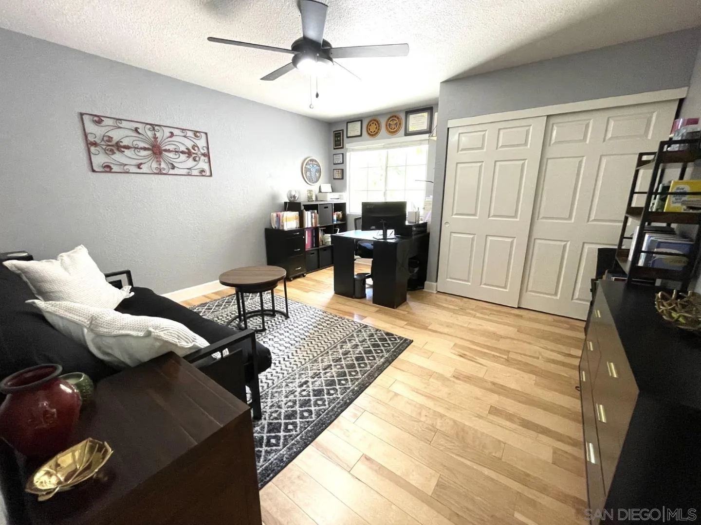 16734 Georgios Way Ramona, CA 92065 - Photo 25 of 35 a bedroom with furniture and a window