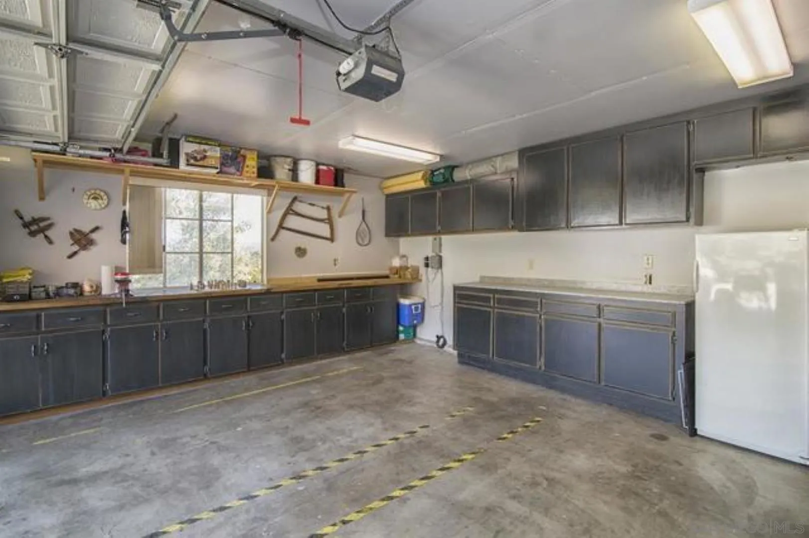 16734 Georgios Way Ramona, CA 92065 - Photo 33 of 35 a kitchen with stainless steel appliances a stove a sink and a refrigerator