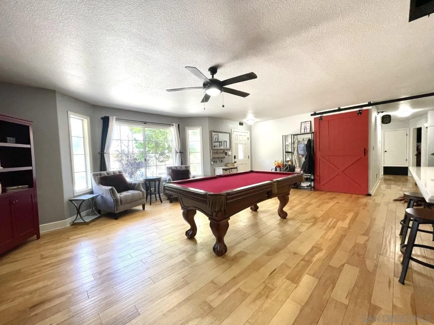 16734 Georgios Way Ramona, CA 92065 - Photo 5 of 35 a room with furniture pool table and windows