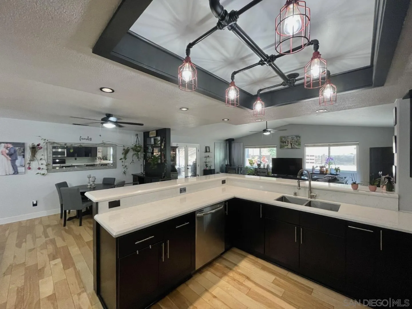 16734 Georgios Way Ramona, CA 92065 - Photo 10 of 35 a kitchen with a sink a counter space appliances and cabinets