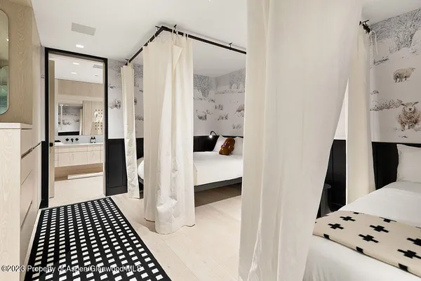 a bathroom with a sink and a shower