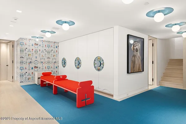 a living room with furniture and a table