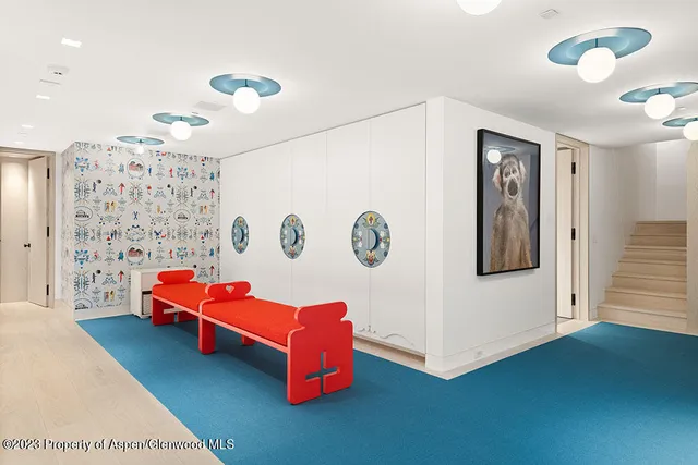 a living room with furniture and a table