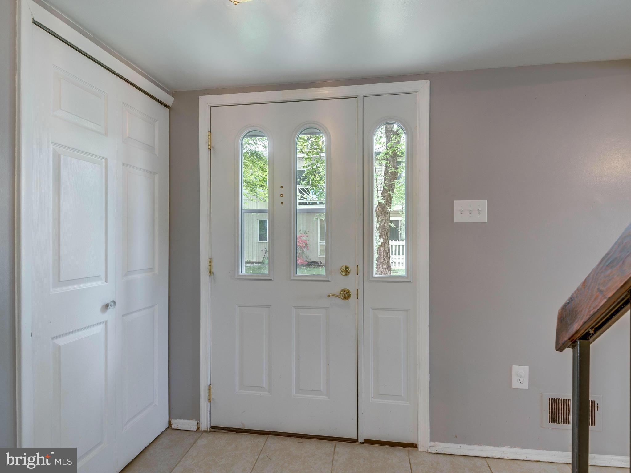 214 North Cottage Road Sterling, VA 20164 - Photo 2 of 25 Foyer Entrance - New Doors