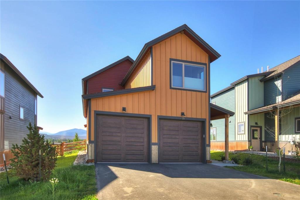 55 Haymaker Street Silverthorne, CO 80498 - Photo 1 of 27 a front view of a house with garden