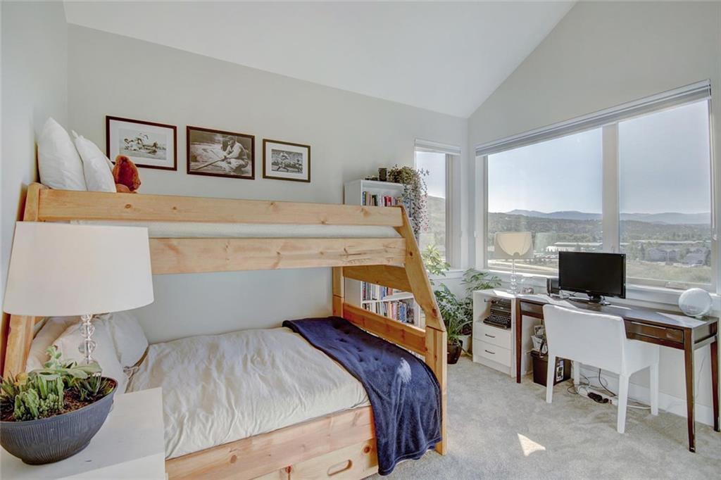 55 Haymaker Street Silverthorne, CO 80498 - Photo 20 of 27 a bedroom with a bed and a desk