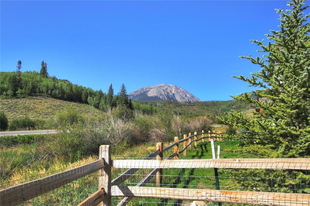 55 Haymaker Street Silverthorne, CO 80498 - Photo 24 of 27 a view of a lake with a mountain in the background