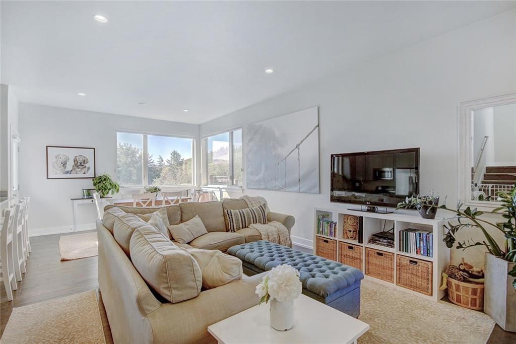 55 Haymaker Street Silverthorne, CO 80498 - Photo 4 of 27 a living room with furniture and a flat screen tv