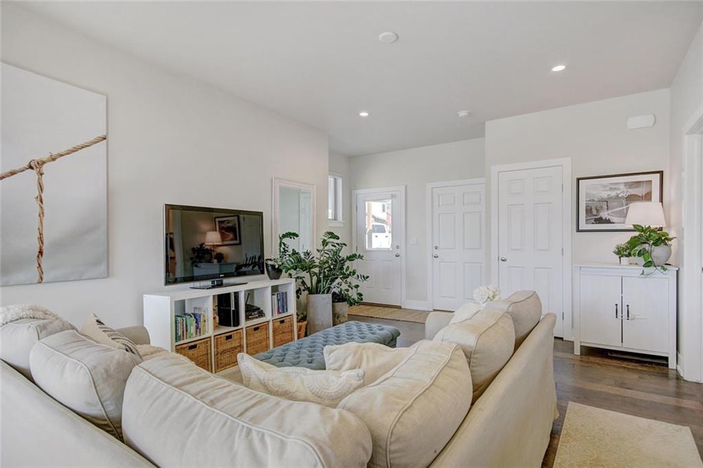 55 Haymaker Street Silverthorne, CO 80498 - Photo 5 of 27 a living room with furniture and a flat screen tv