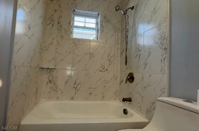 a bathroom with a bathtub