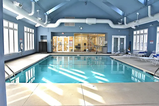 a view of a living room and kitchen floor