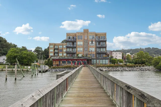 a view of balcony with furniture