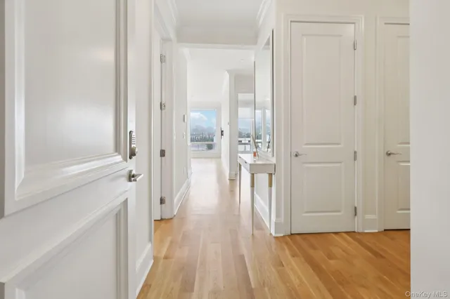 a view of a bathroom with a sink and a mirror