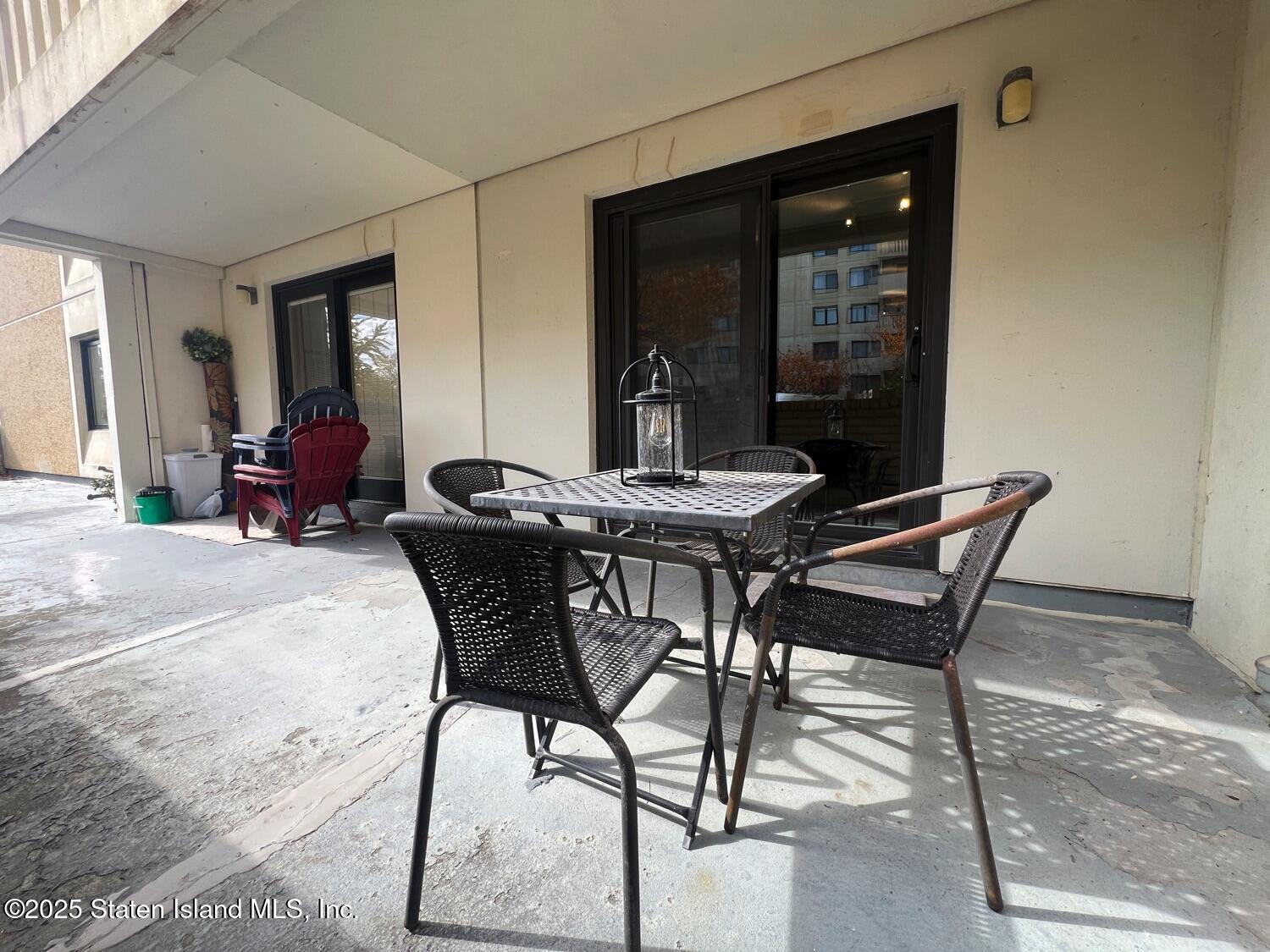11 Windham Loop, Unit 1NN Staten Island, NY 10314 - Photo 17 of 25 a dining room with furniture and window