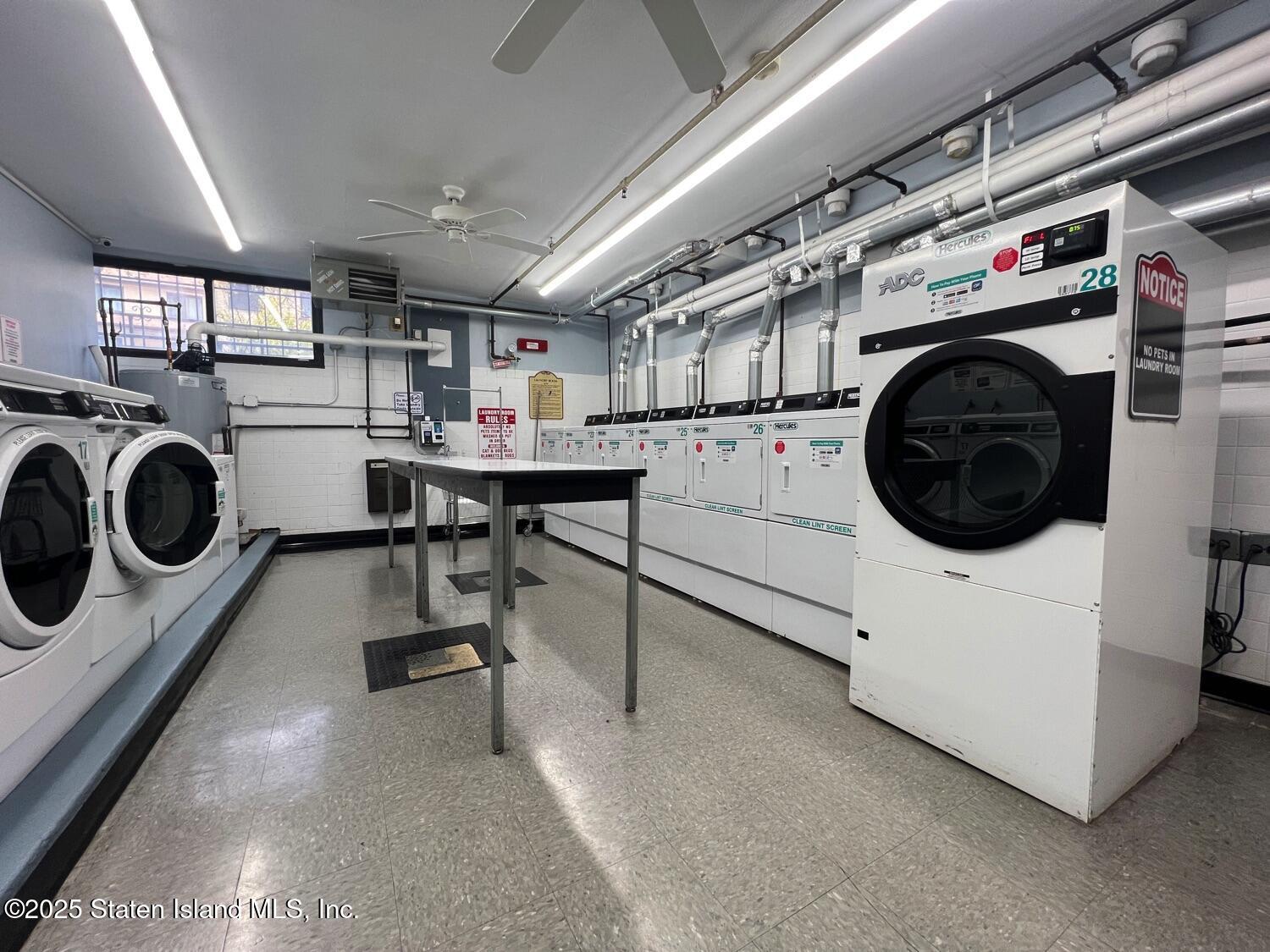 11 Windham Loop, Unit 1NN Staten Island, NY 10314 - Photo 20 of 25 a utility room with dryer and washer