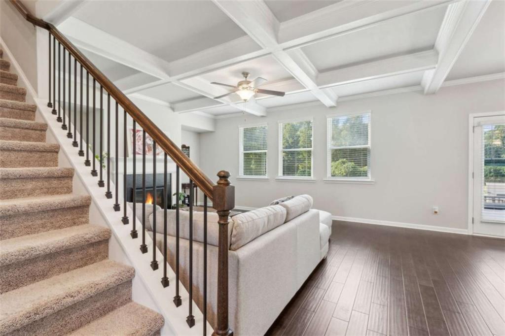 429 Paxton Lane Jefferson, GA 30549 - Photo 12 of 53 a view of staircase with wooden floor and fan