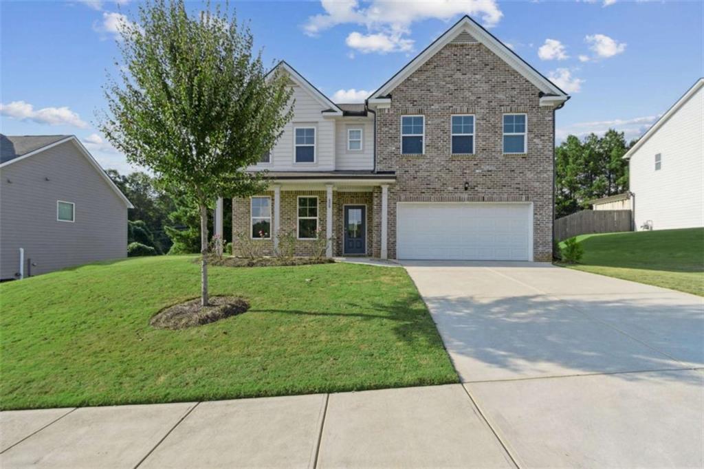 429 Paxton Lane Jefferson, GA 30549 - Photo 2 of 53 a front view of a house with a yard