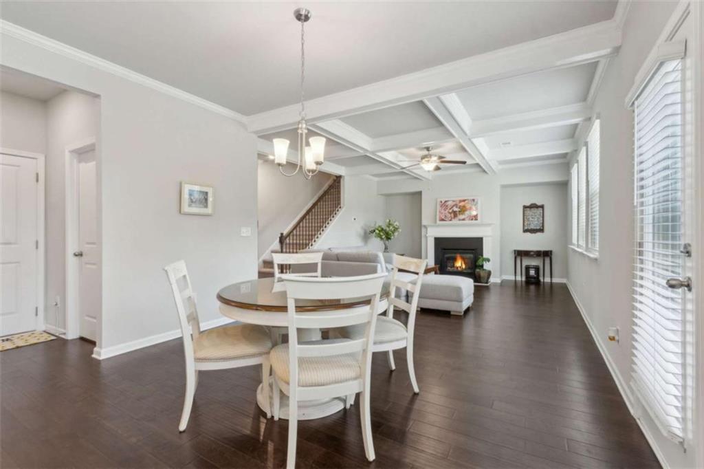 429 Paxton Lane Jefferson, GA 30549 - Photo 21 of 53 a view of a dining room with furniture wooden floor and chandelier