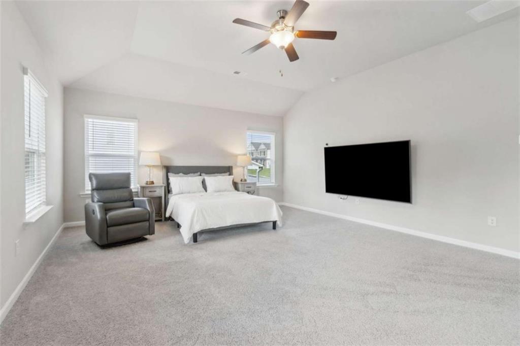 429 Paxton Lane Jefferson, GA 30549 - Photo 32 of 53 a bedroom with a bed and a flat screen tv