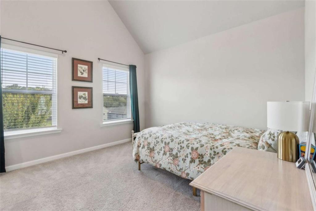 429 Paxton Lane Jefferson, GA 30549 - Photo 38 of 53 a bedroom with a bed and a window