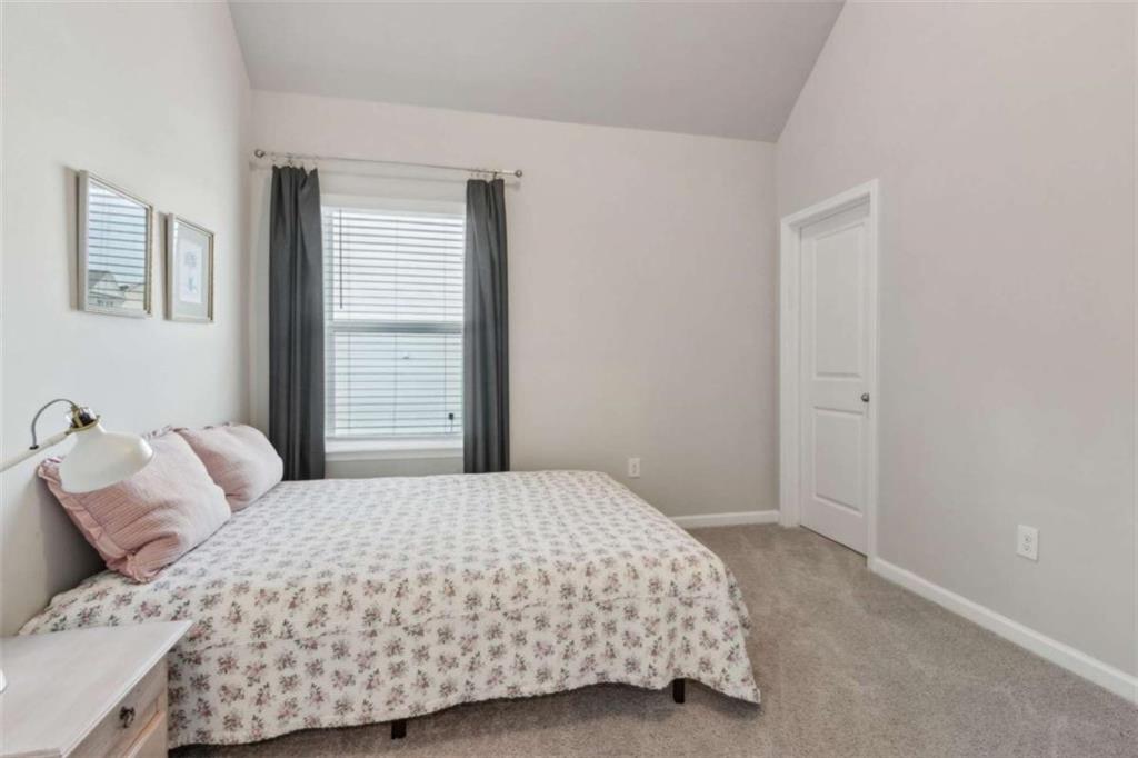 429 Paxton Lane Jefferson, GA 30549 - Photo 42 of 53 a bedroom with a bed and a window