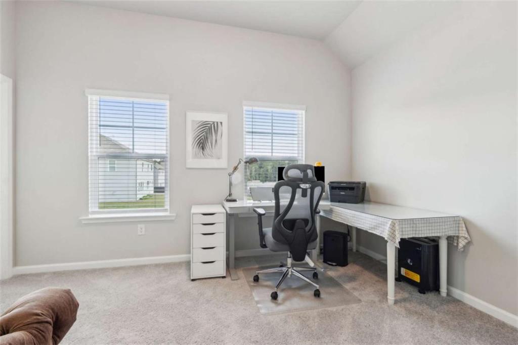 429 Paxton Lane Jefferson, GA 30549 - Photo 45 of 53 a view of a workspace with furniture and a window