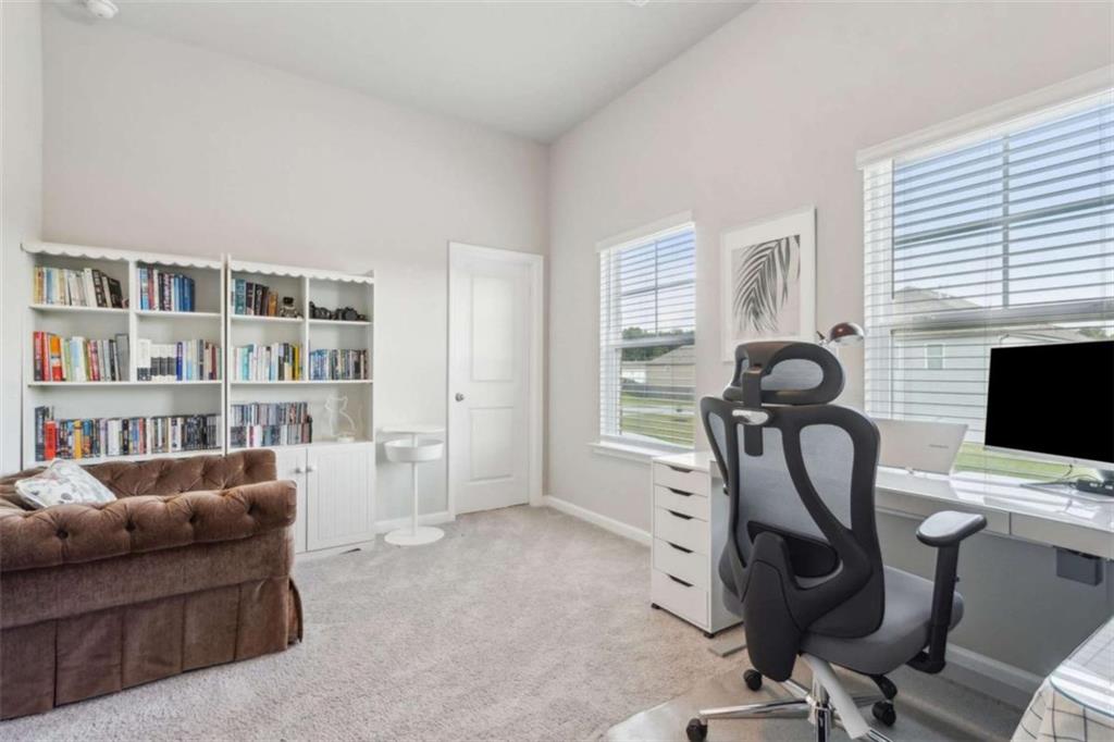 429 Paxton Lane Jefferson, GA 30549 - Photo 46 of 53 a view of a livingroom with workspace and a window