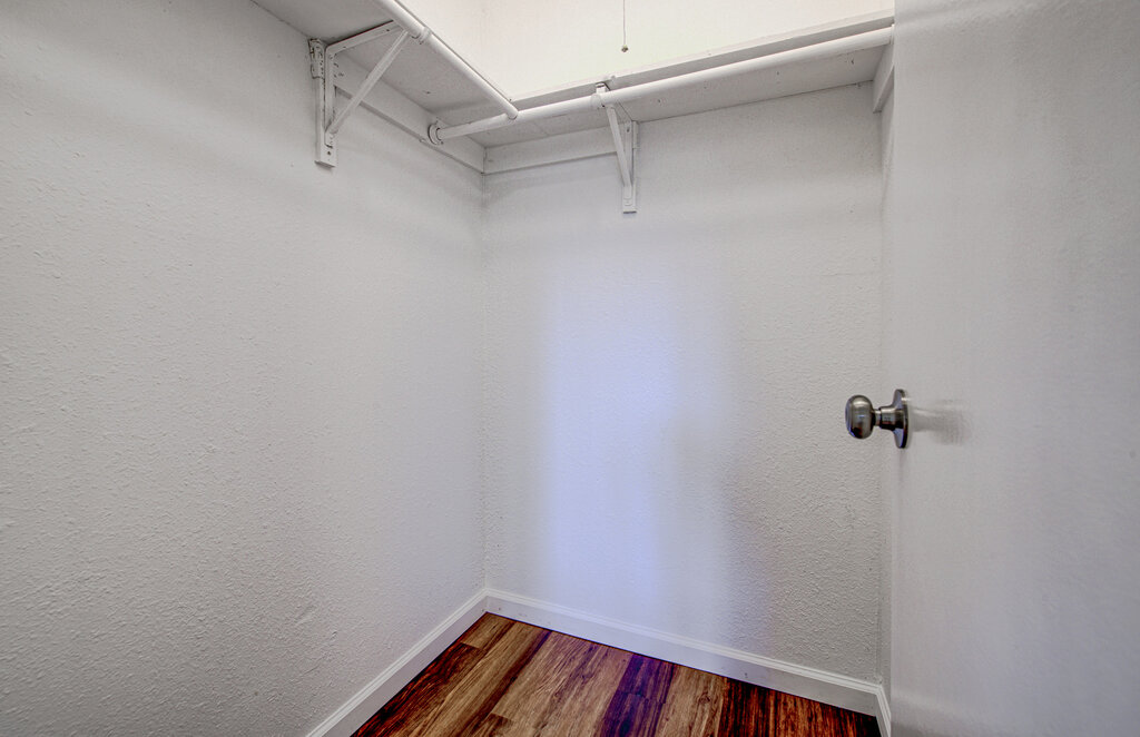 1306 Bonnie Brae Street, Unit B Austin, TX 78753 - Photo 16 of 28 a view of a room with racks on the wall