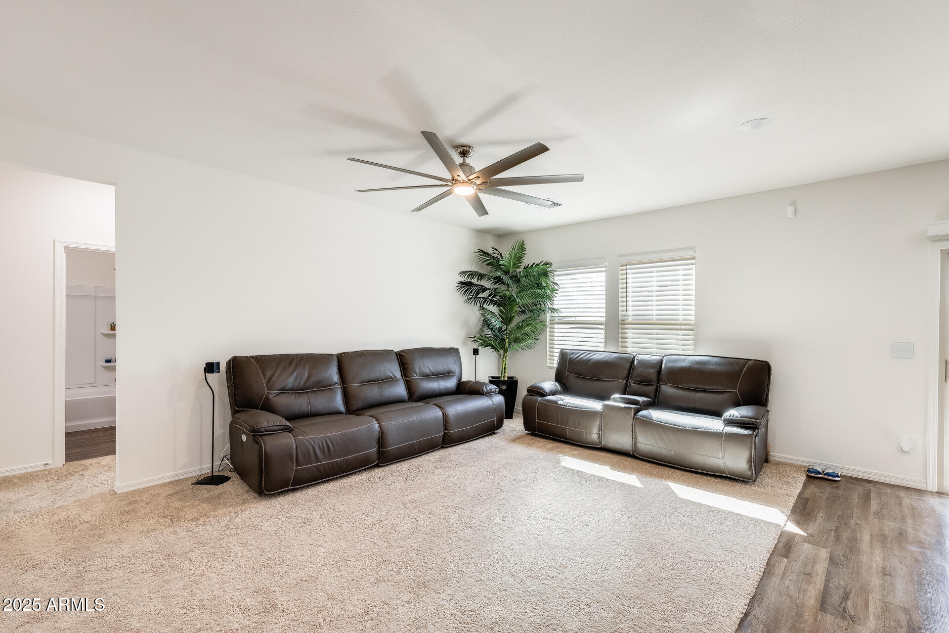 5663 East Moira Road Florence, AZ 85132 - Photo 12 of 37 a living room with furniture and a large window