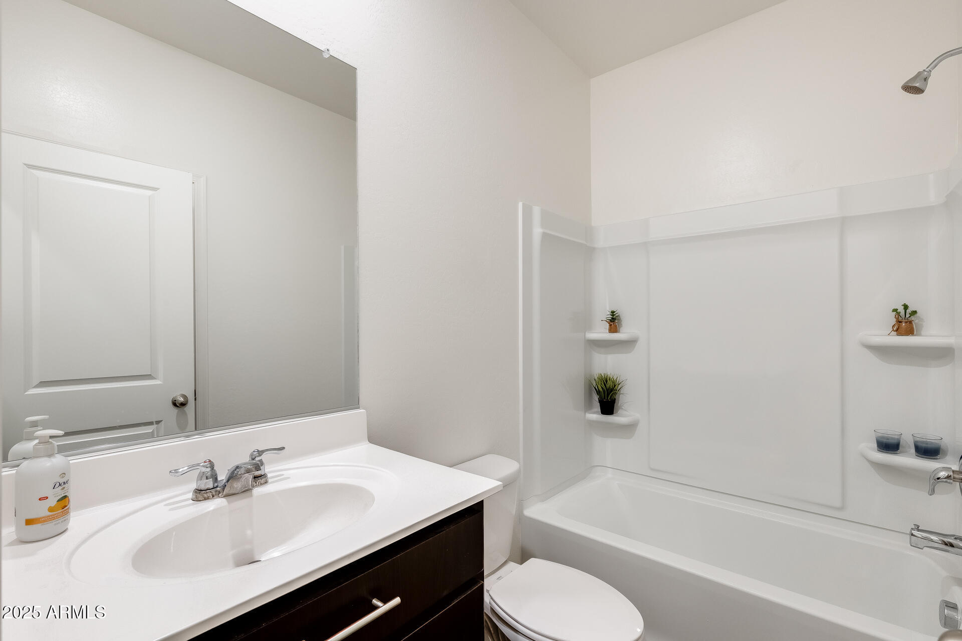 5663 East Moira Road Florence, AZ 85132 - Photo 16 of 37 a bathroom with a sink toilet and bathtub