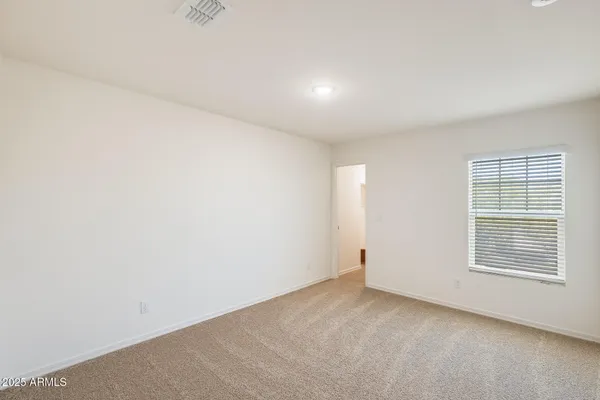 a workspace with furniture and a window
