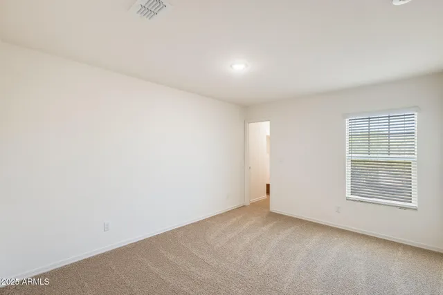 a workspace with furniture and a window