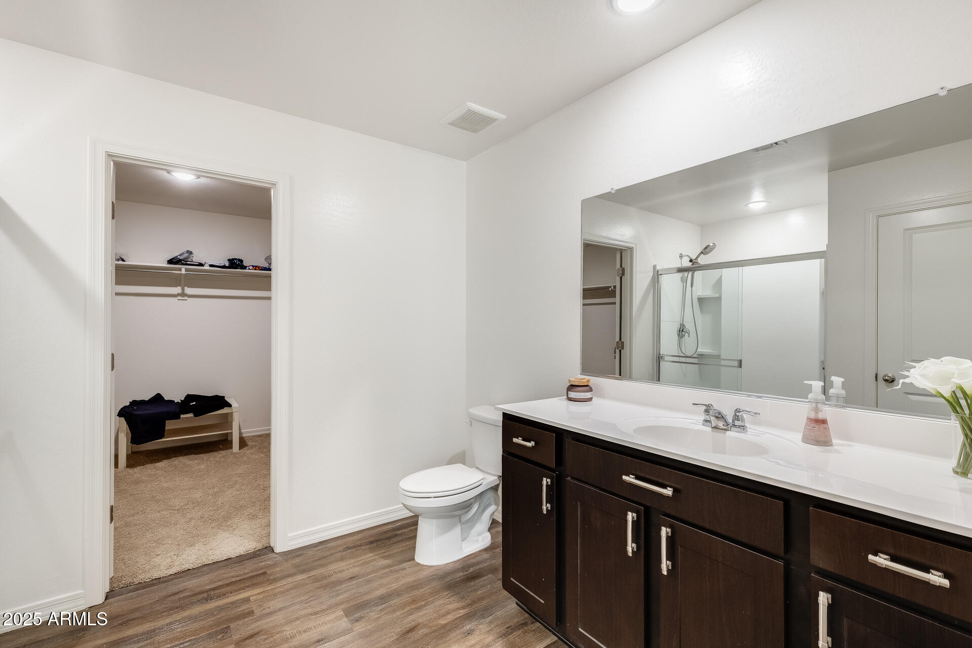 5663 East Moira Road Florence, AZ 85132 - Photo 30 of 37 a bathroom with a double vanity sink and a mirror
