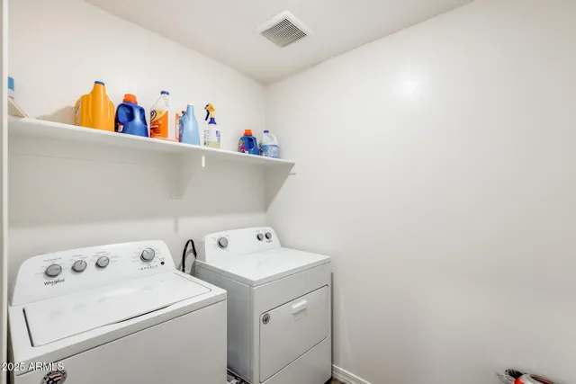 a room with a cabinet and storage