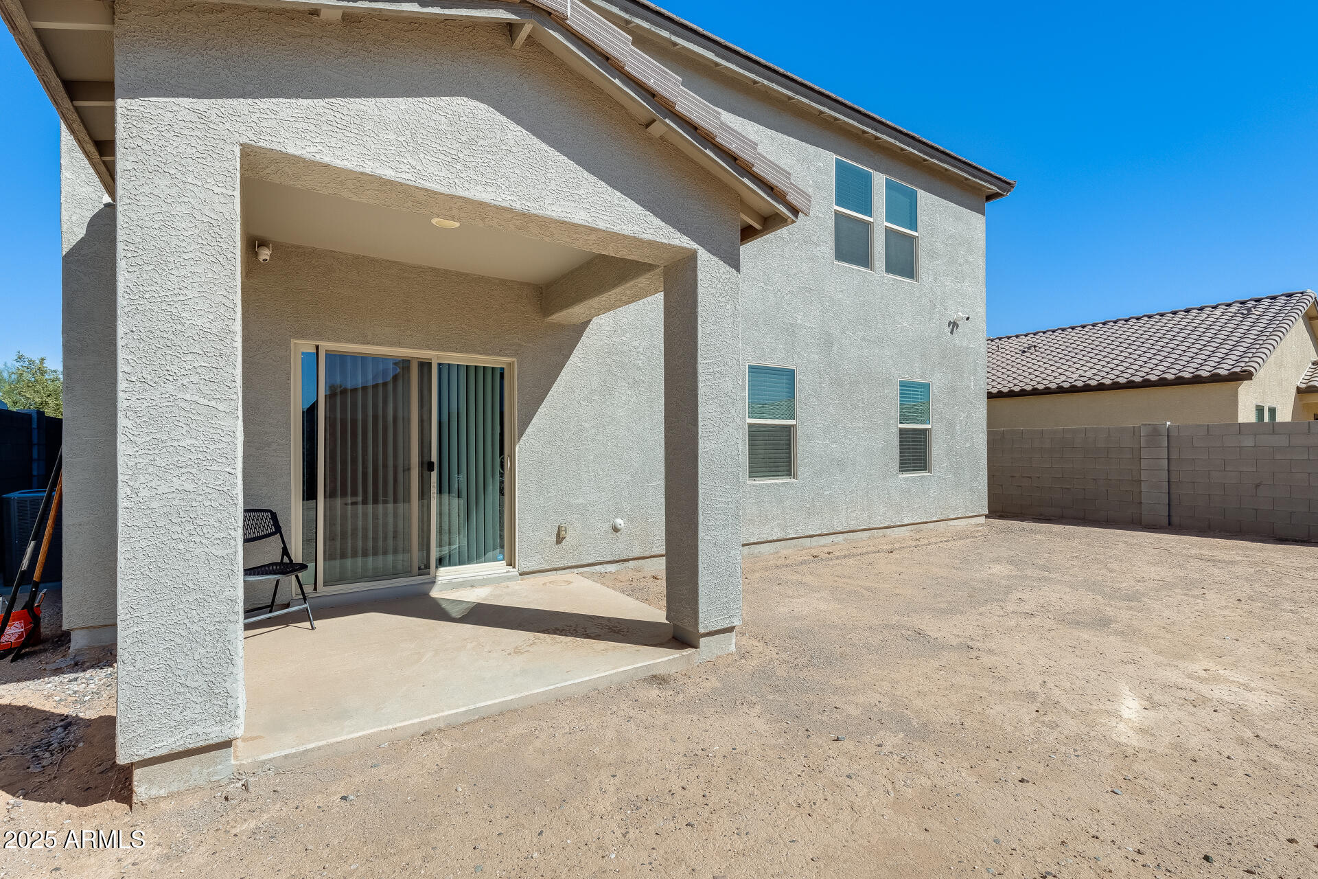5663 East Moira Road Florence, AZ 85132 - Photo 36 of 37 a view of a white house with a outdoor space