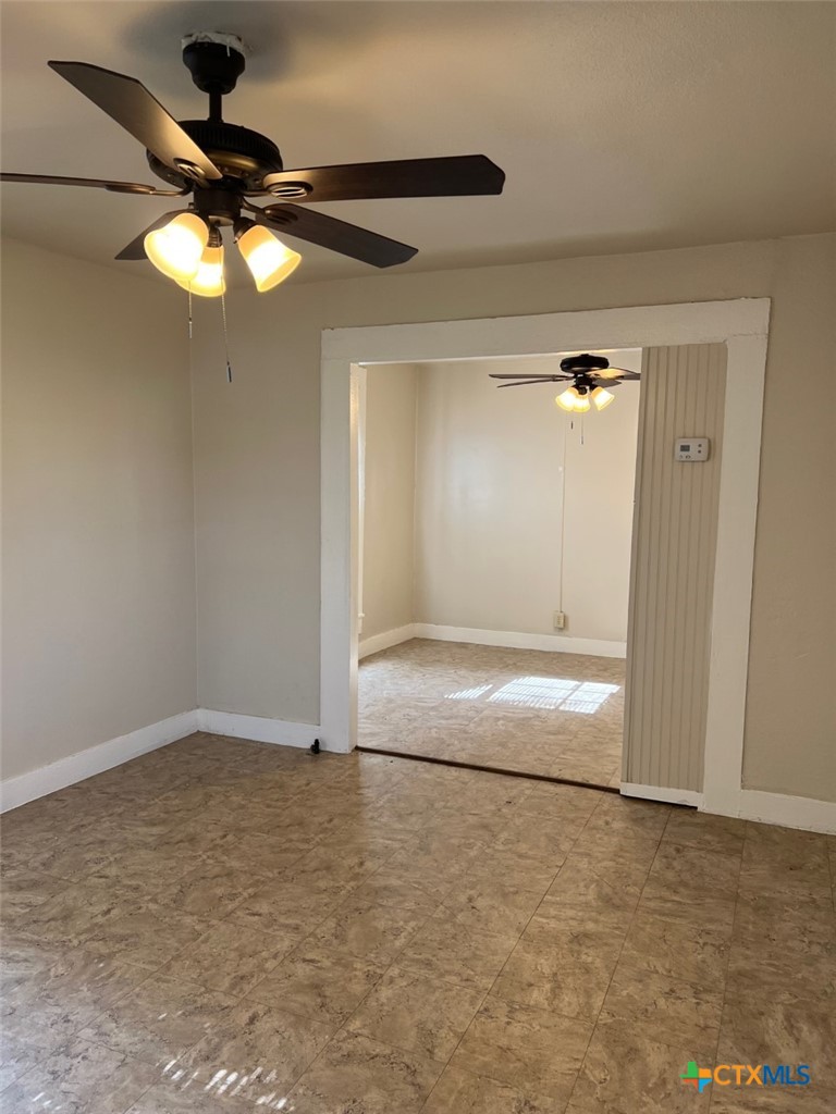 225 Lamar Street Luling, TX 78648 - Photo 6 of 12 a view of an empty room